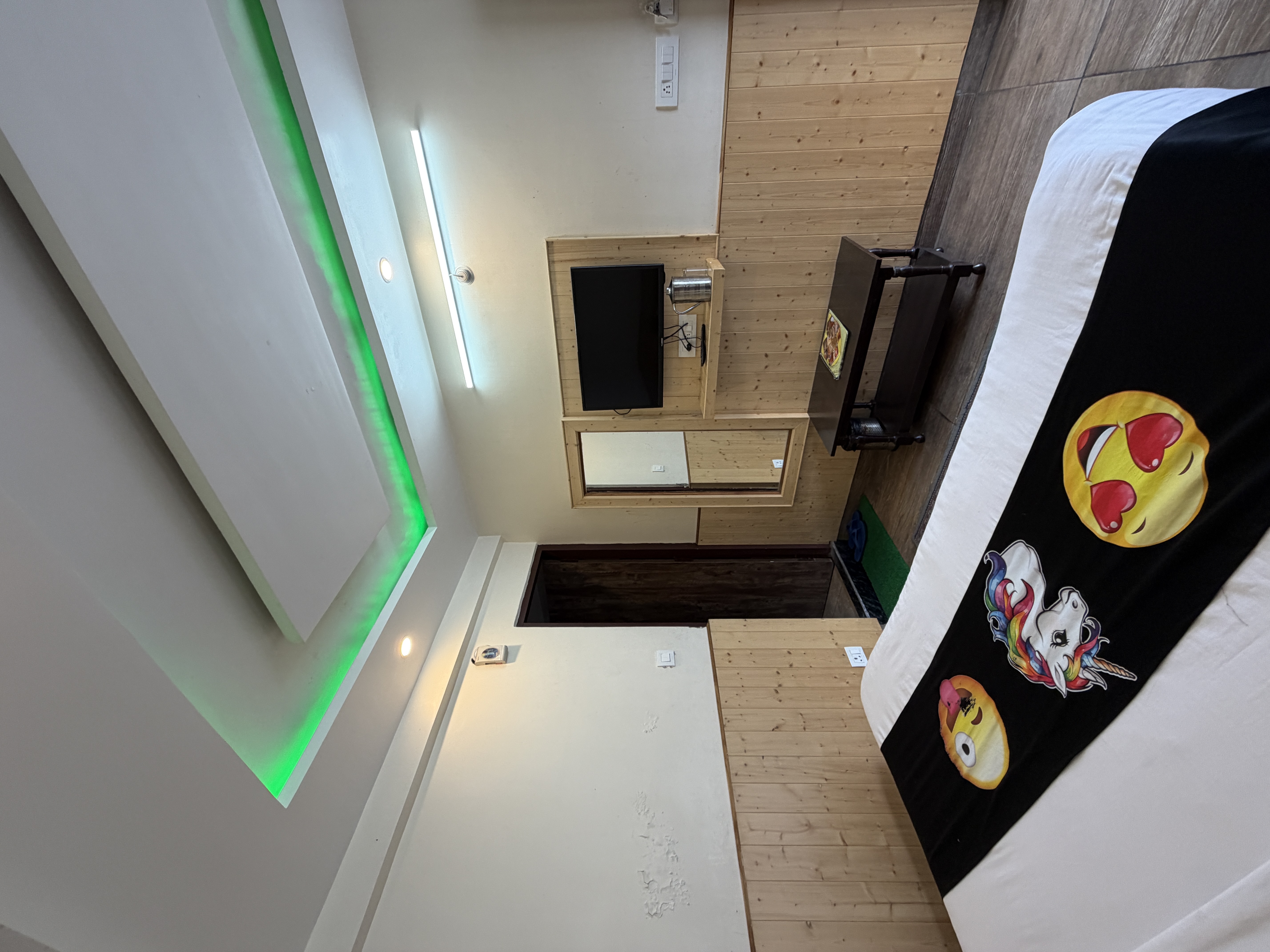 Hotel room interior with ambient lighting in Nainital