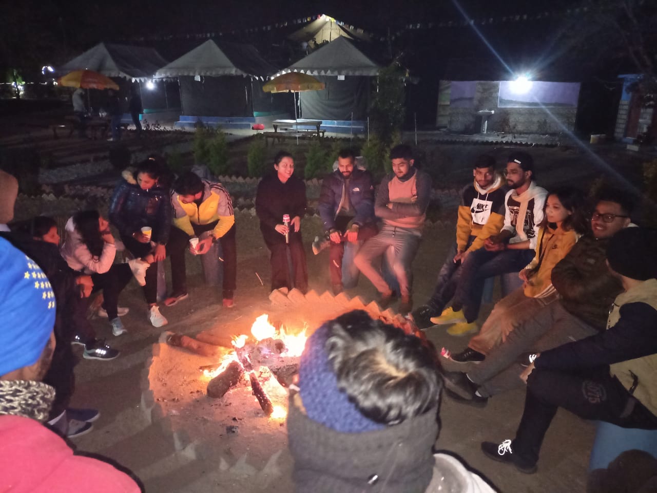 Bonfire night with guests at the campsite