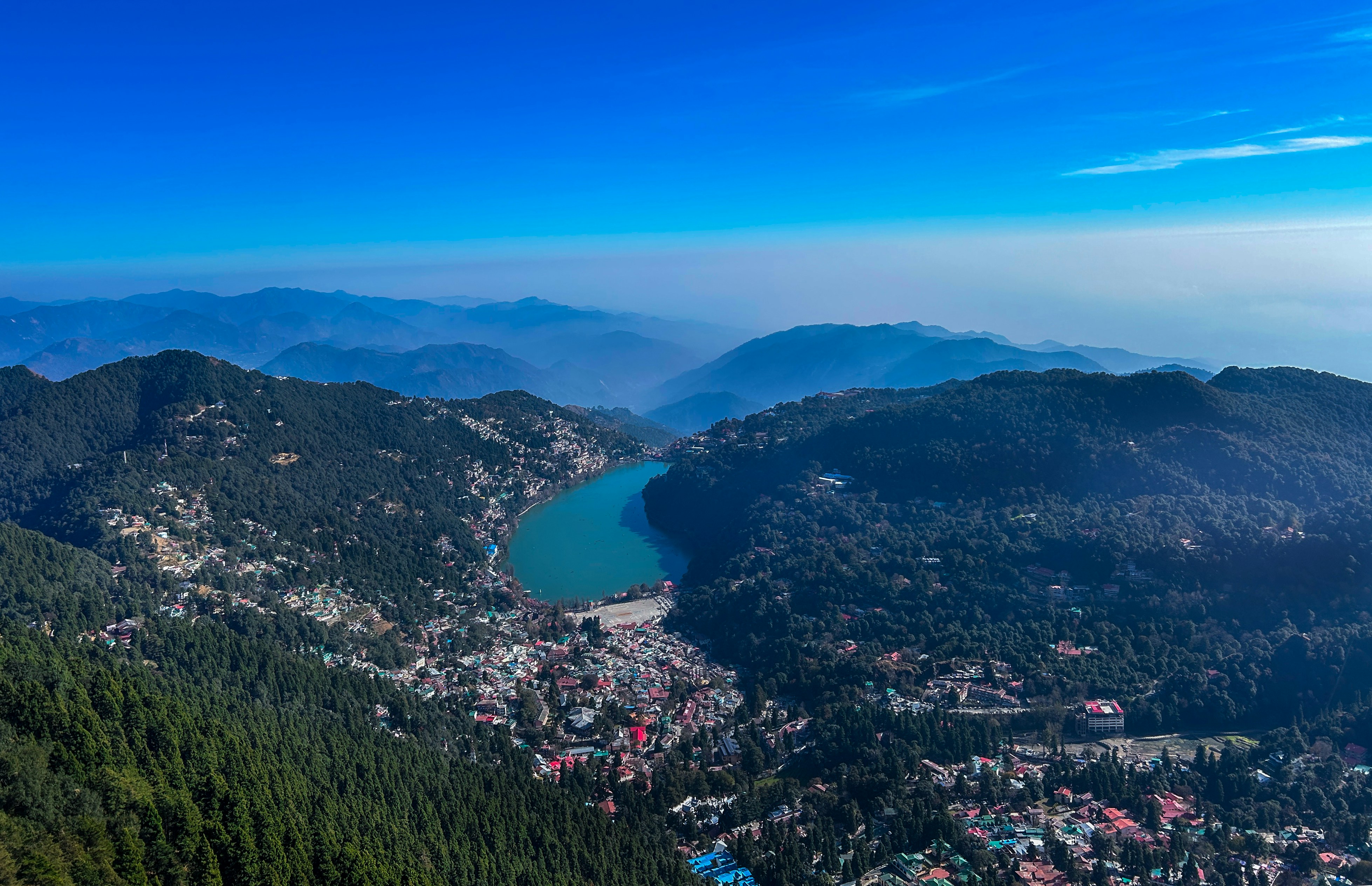 Aerial view of Naini Lake, Nainital — emerald water nestled in the Kumaon hills